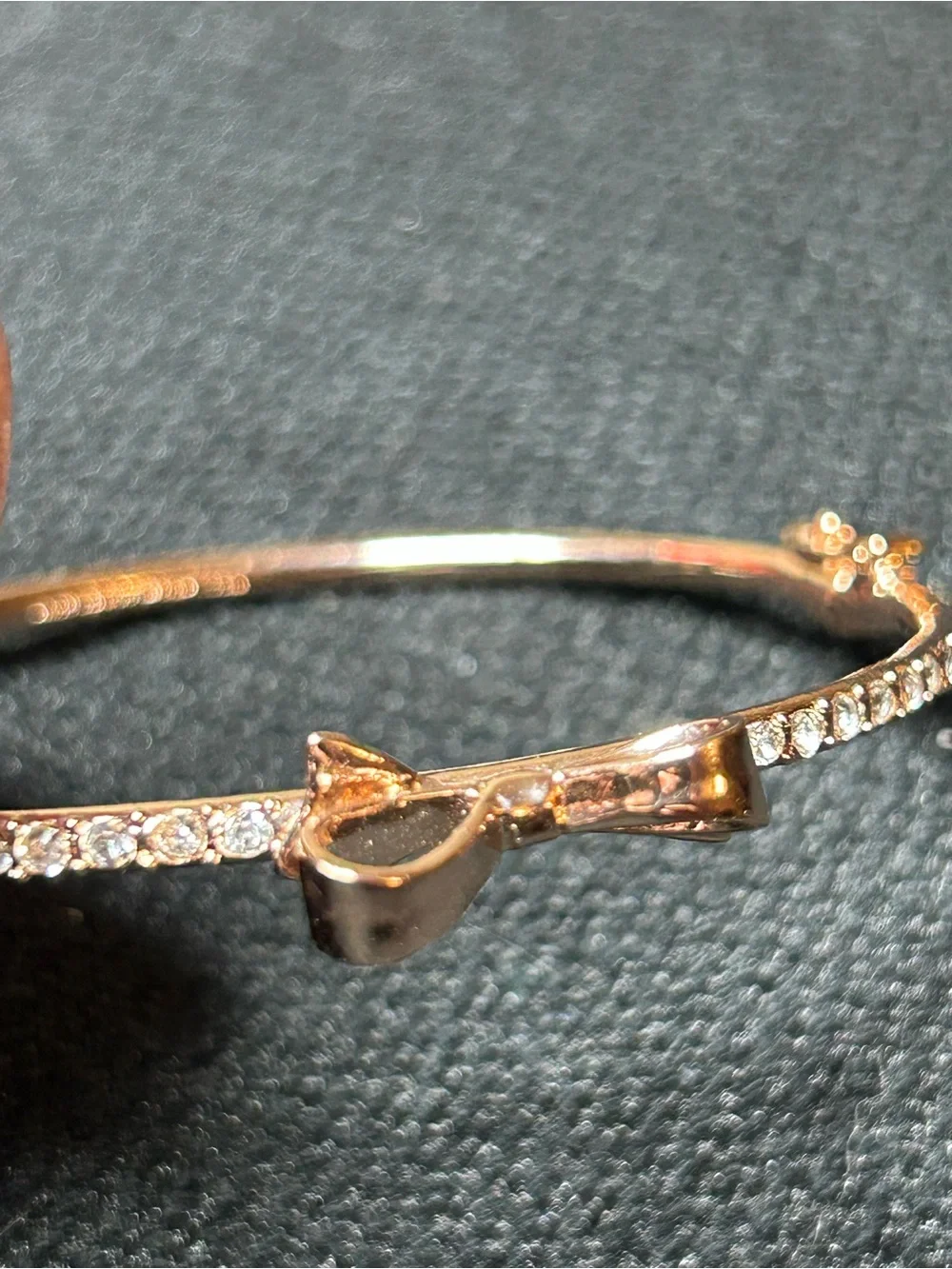 Kate Spade New York Gold-Tone Bow Bangle Bracelet with Crystal Accents - Picture 4 of 9